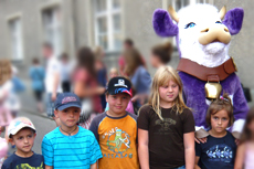 Children with the 'Milka' cow'